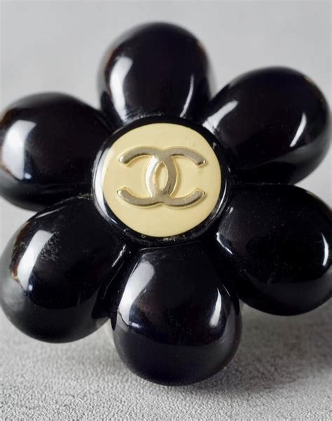 chanel jewlery black camellia|chanel camellia brooches.